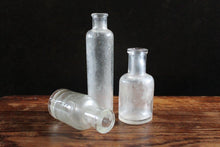 Load image into Gallery viewer, Small Collection of Rustic Victorian Glass Phial Bottle Vases
