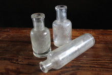 Load image into Gallery viewer, Small Collection of Rustic Victorian Glass Phial Bottle Vases
